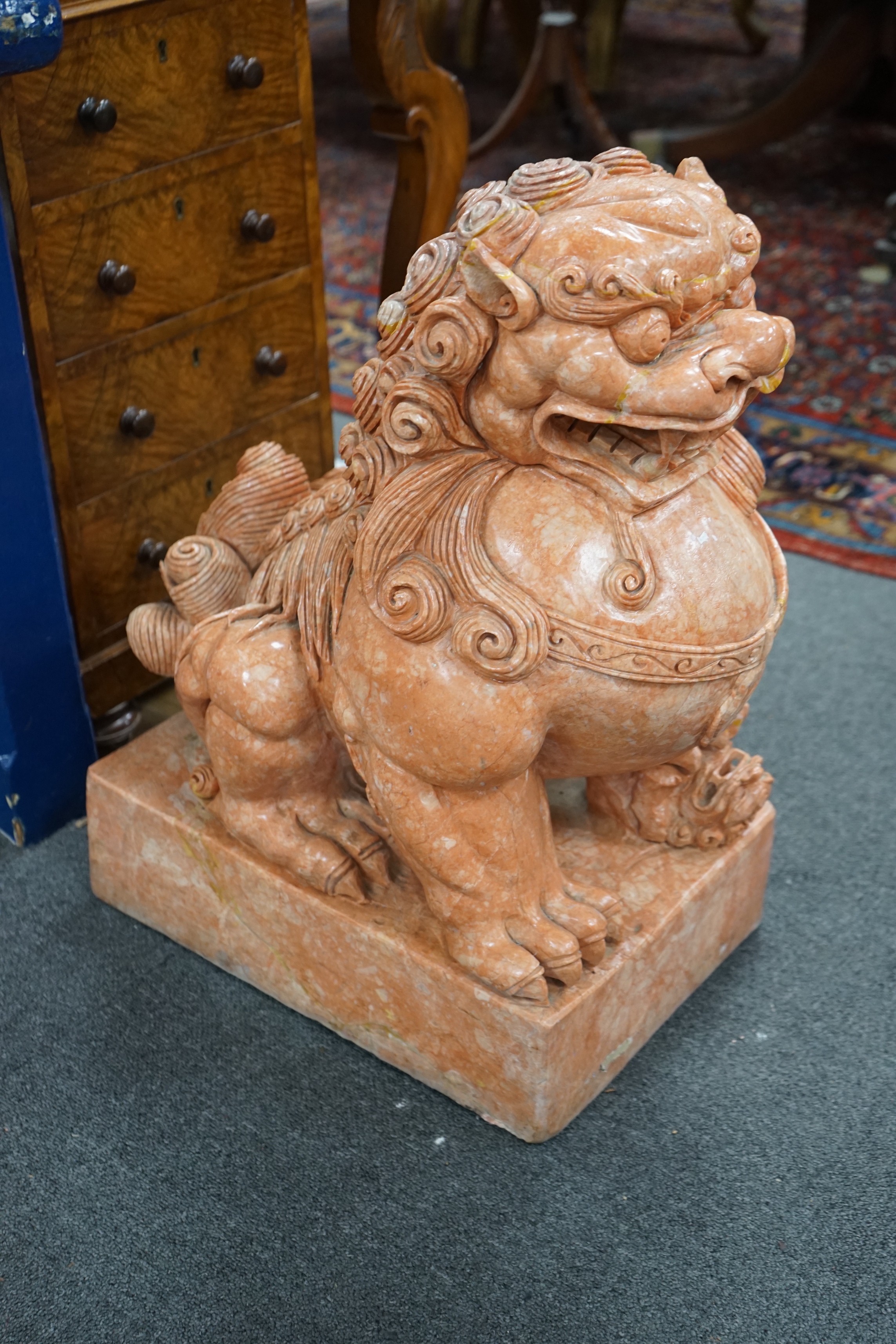 A pair of Chinese carved marble dogs of Fo, width 31cm, height 61cm